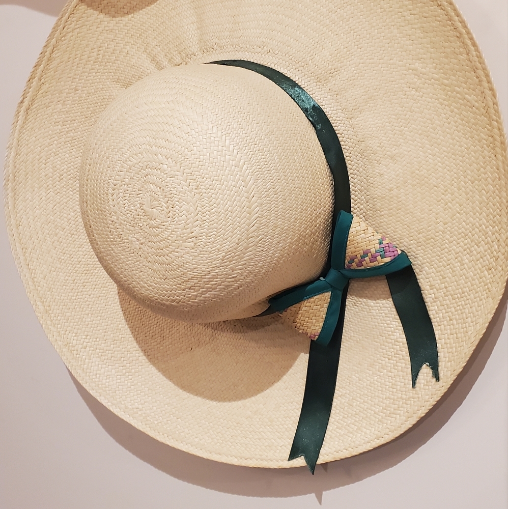 Hand woven straw hat with a matching straw bow